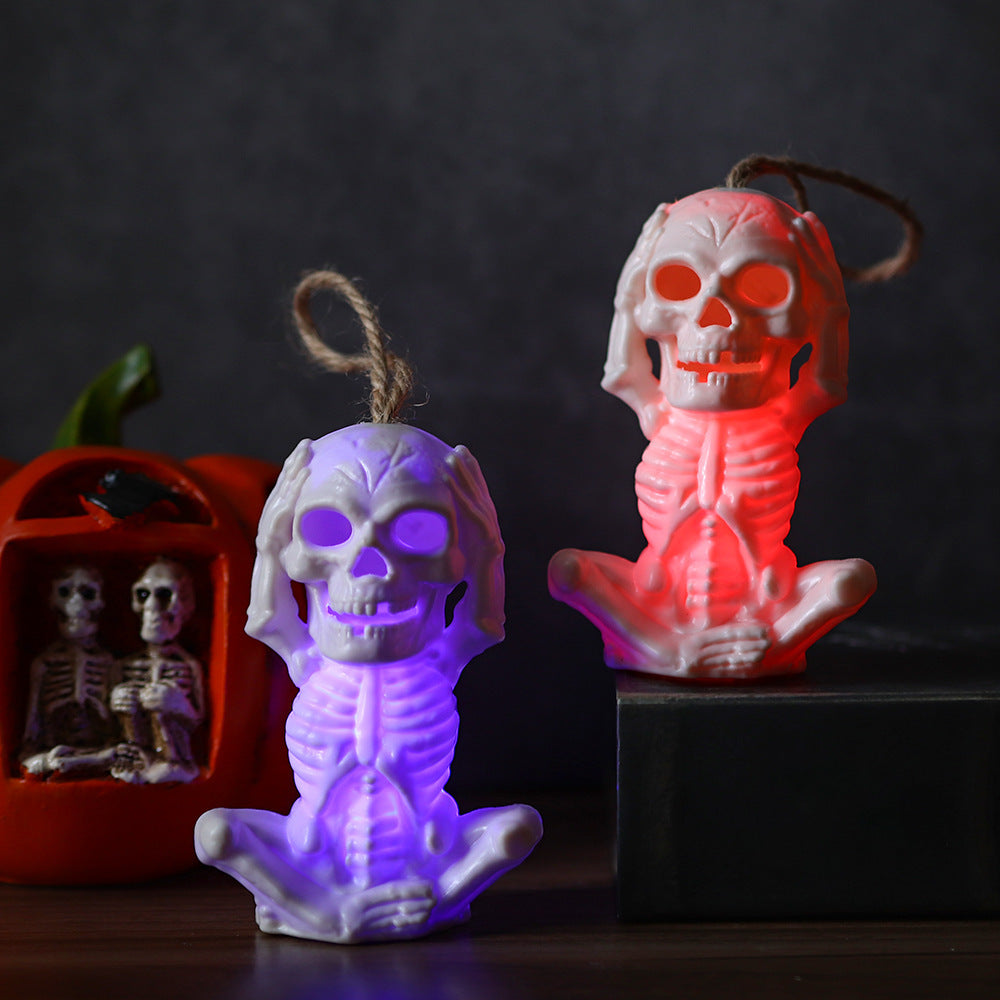 Light Up Skull in Yoga Pose Halloween Decoration in Multiple Colors