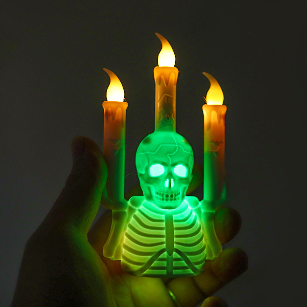 Skelet torso met valse kaarsenvlammen en groene LED's