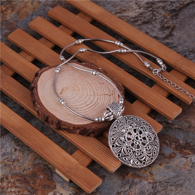 Mandala Inspired Metal Disc Necklace