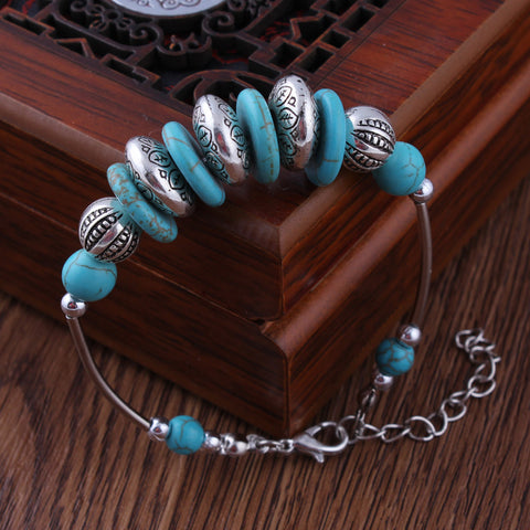 Turquoise and Metal Rings Bracelet